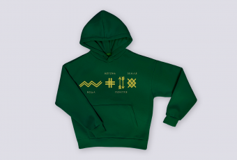 Green hoodie with embroidery of runes